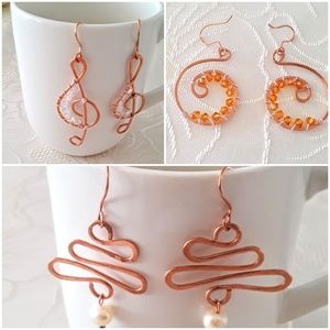Copper hand wired earrings with crystal beads and.